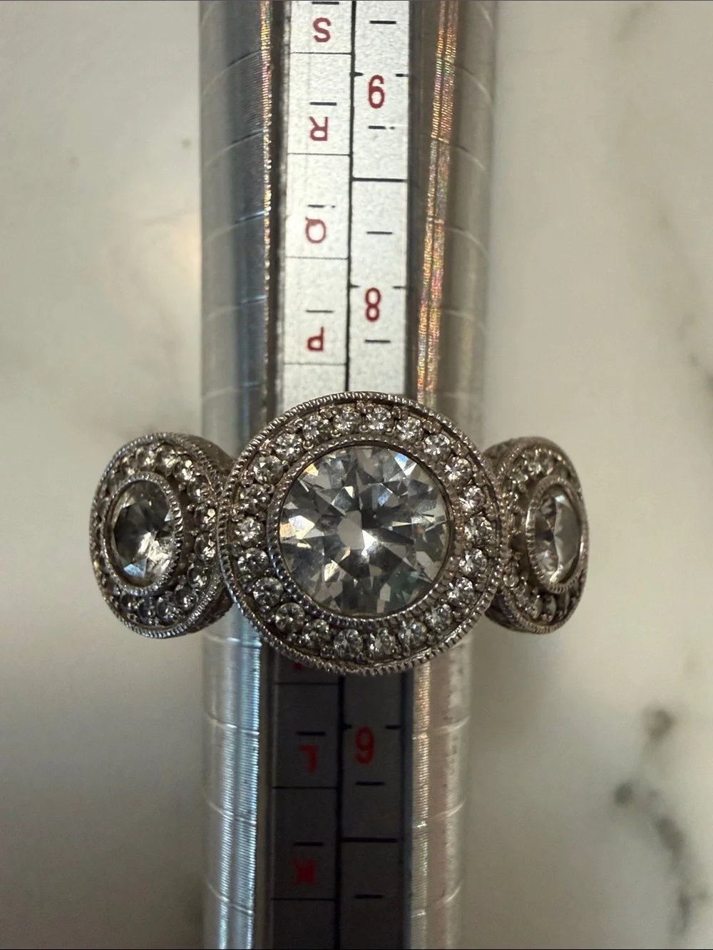 Sterling silver triple setting halo ring with CZs, size 7